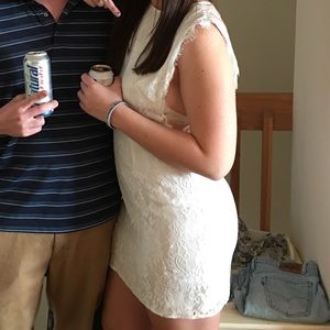 White lace dress with back cut out.